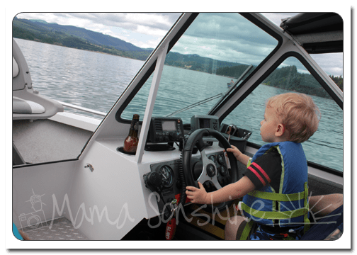 Our friend let Ian help him drive the boat